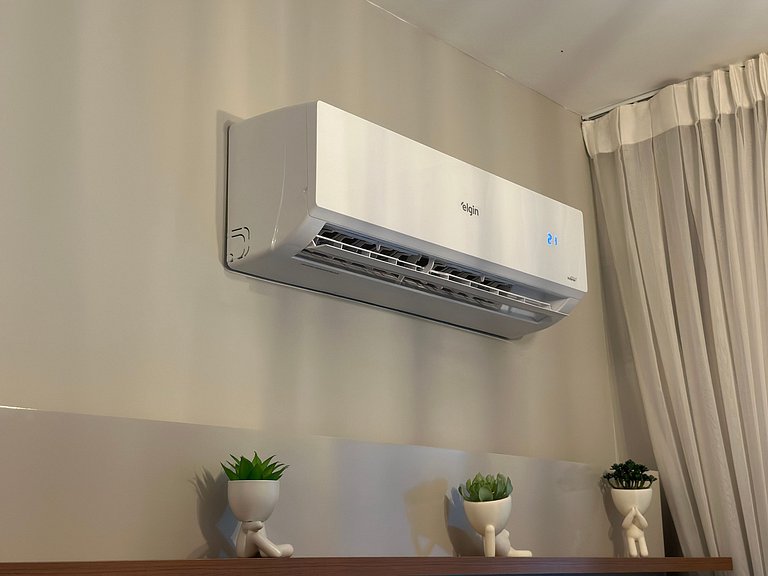 Conforto c/ Vista Mar: Apto com Ar e Garagem