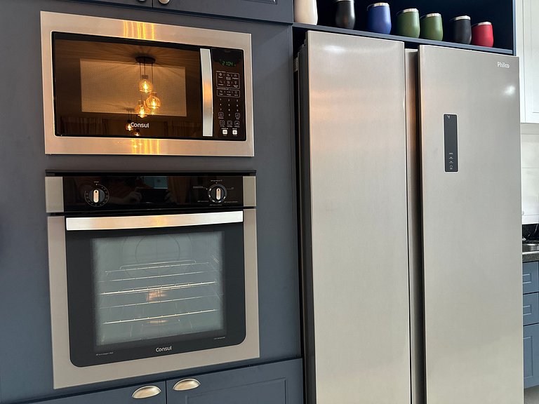 Conforto c/ Vista Mar: Apto com Ar e Garagem