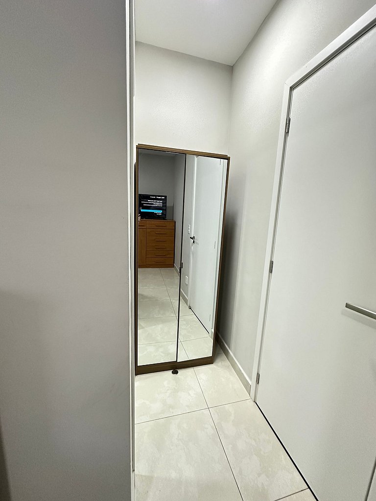 Conforto c/ Vista Mar: Apto com Ar e Garagem