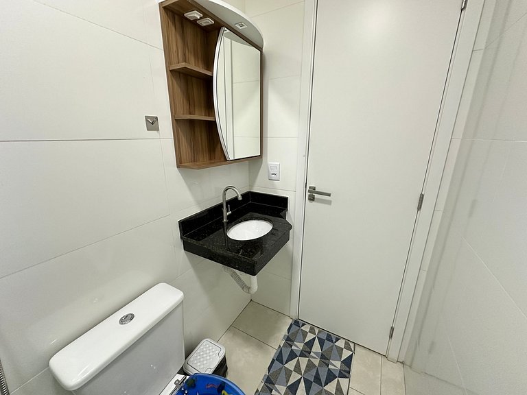 Conforto c/ Vista Mar: Apto com Ar e Garagem