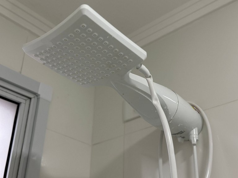 Conforto c/ Vista Mar: Apto com Ar e Garagem