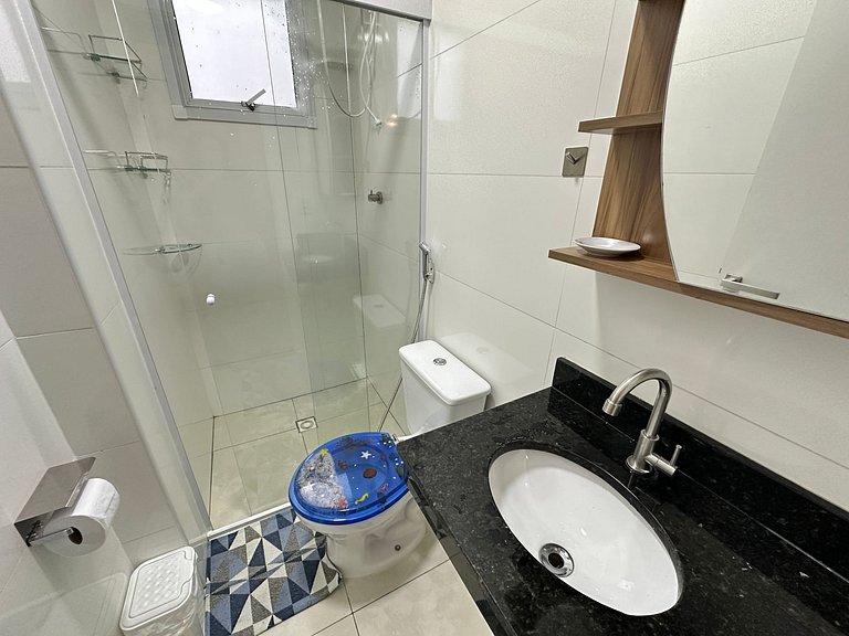 Conforto c/ Vista Mar: Apto com Ar e Garagem